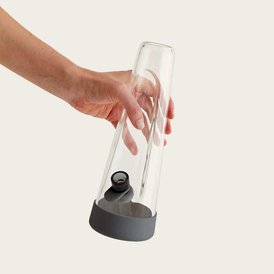 Session Goods store photo: a tall clear glass piece held by one hand