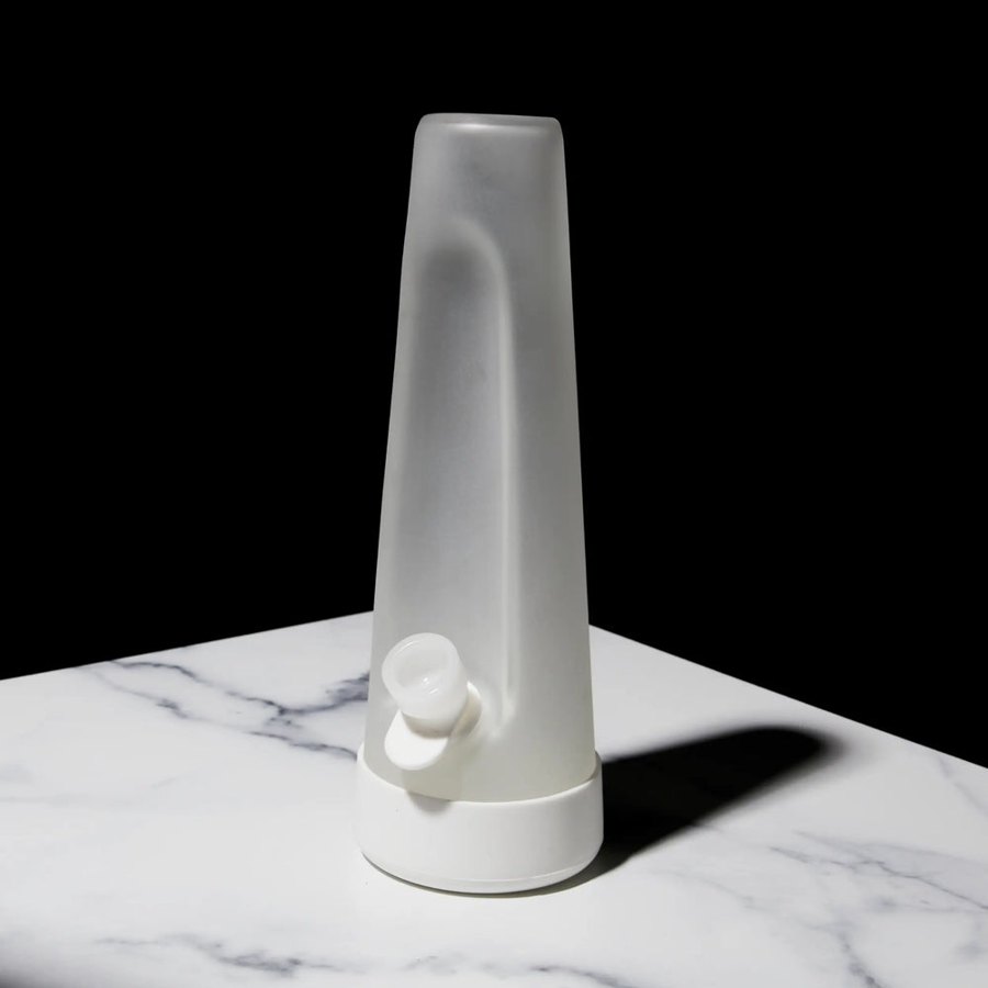 Session Goods store photo: a frosted white glass piece on a marble table